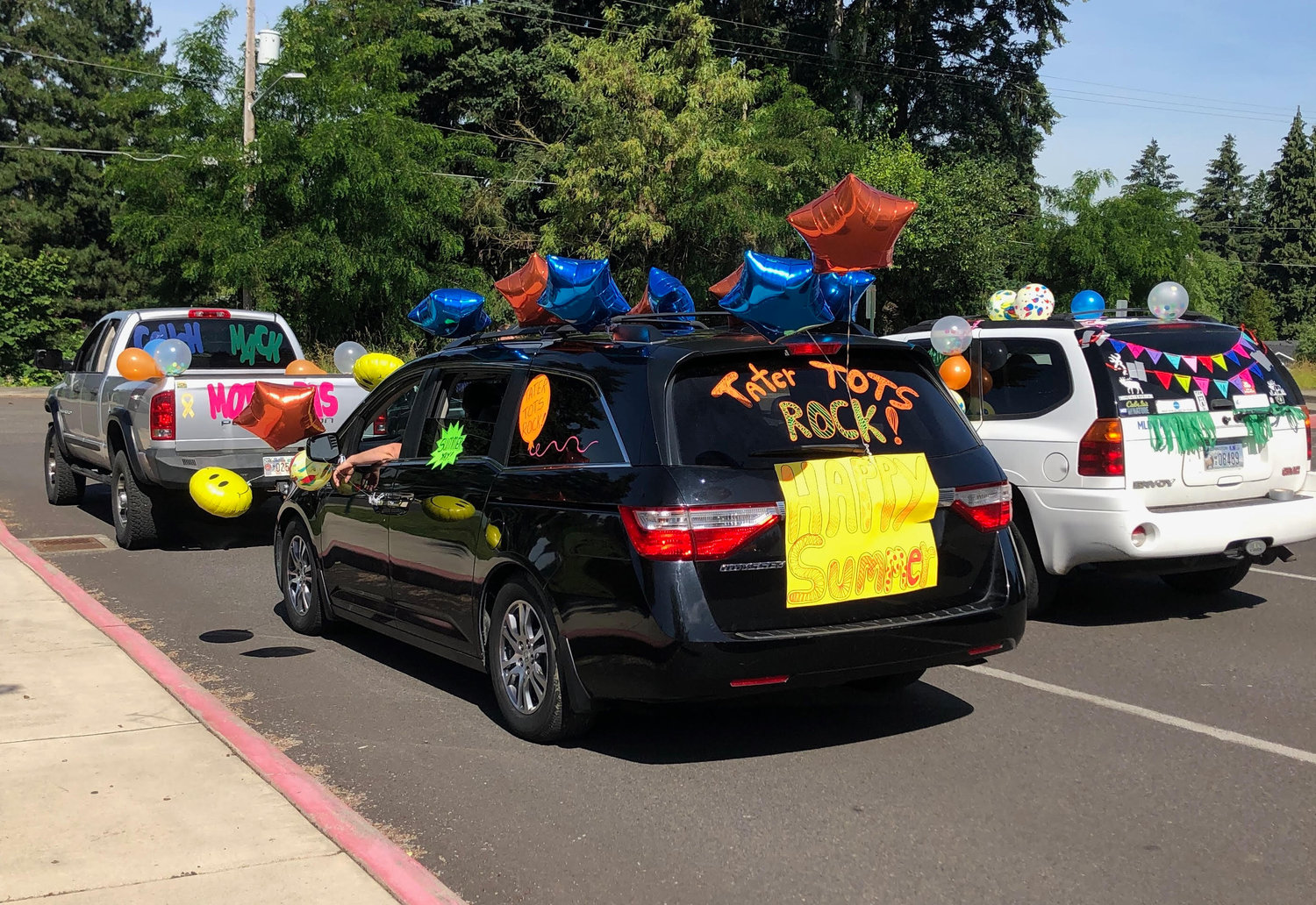 Union Ridge Elementary School teachers decorated their cars with signs and balloons for a car parade to mark the end of the school year. 