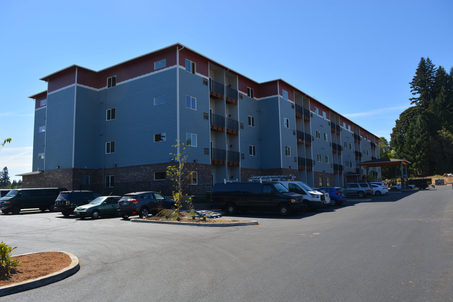 The Trails at Salmon Creek is a new four-story apartment community for those ages 62 and up. The building has 94 units with indoor hallways along with a community room, craft room and fitness center.