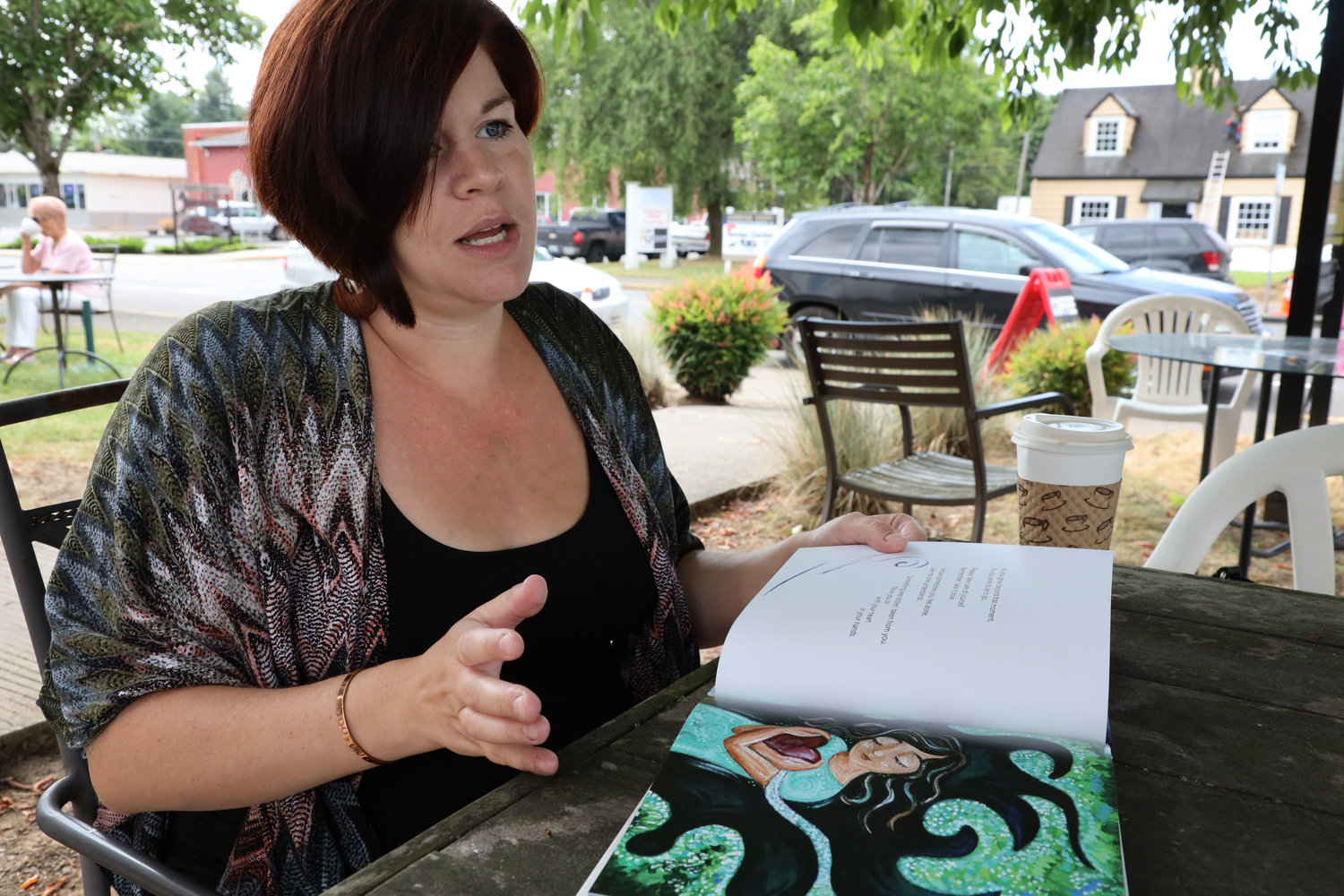 Megan Hindi speaks about her book with The Reflector Newspaper while at Old Town Battle Grounds July 18.