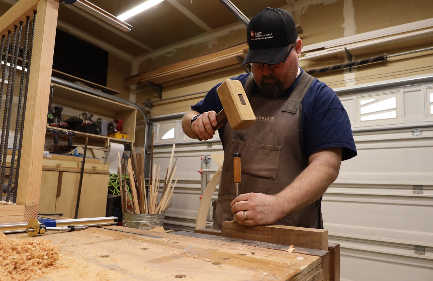 Woodworker Nathan Thompson creates a mortise and tenon joint with a mallet that he made himself at his in-home shop in Vancouver March 6.