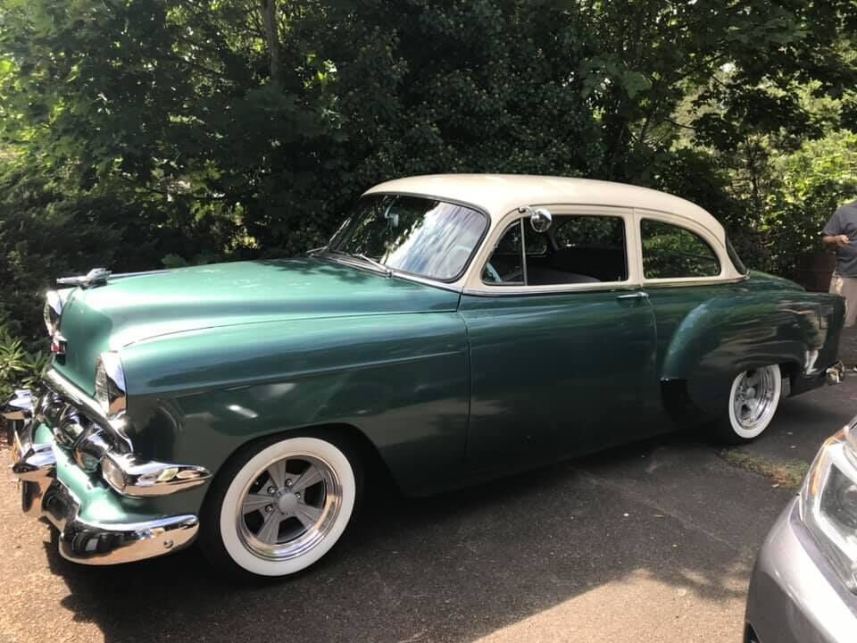 Jessica DeShiell drives a 1954 Chevy. When released, a two-door 1954 Chevy Bel Air sedan was about $1,600 on the showroom floor.