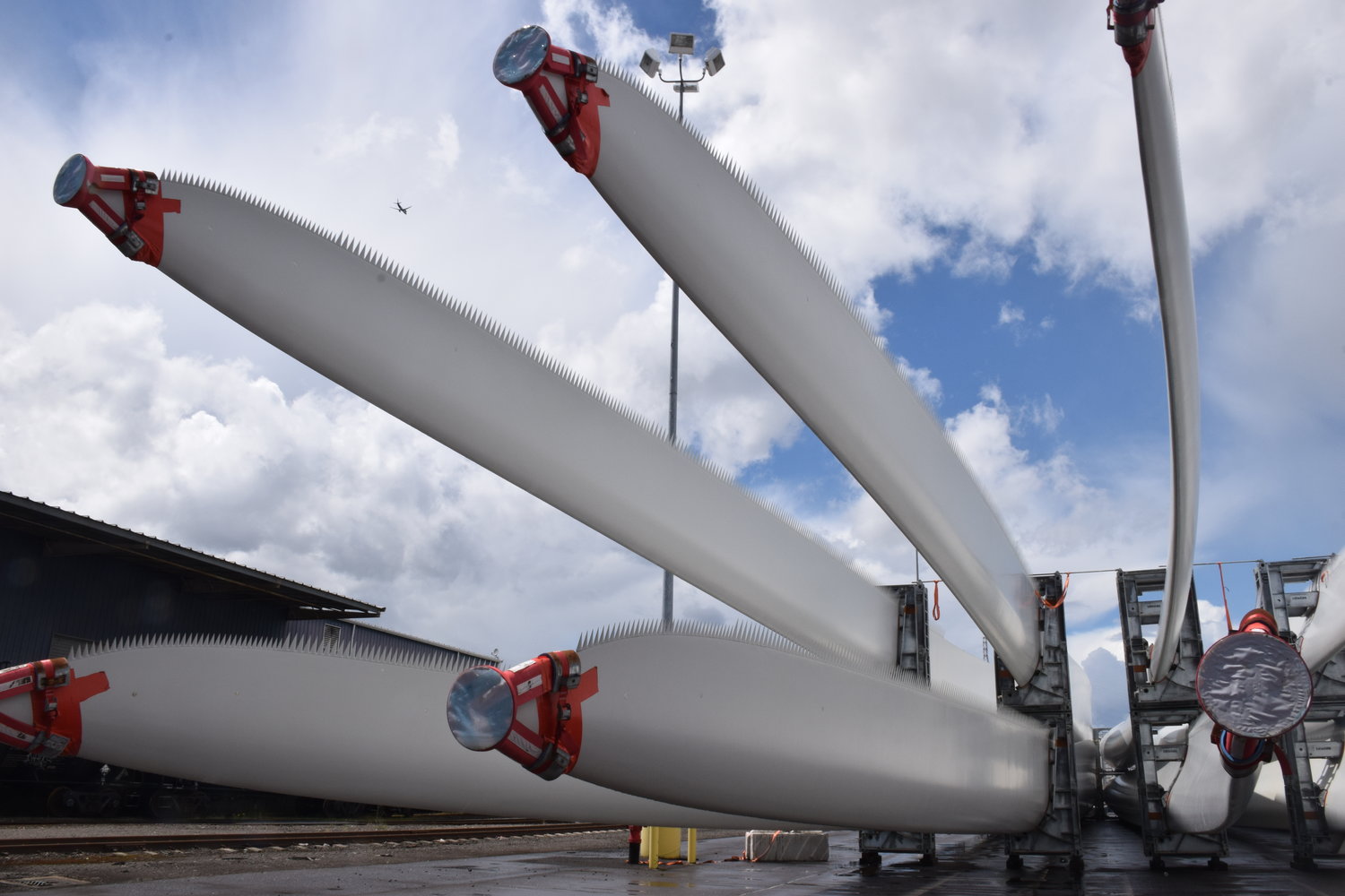 Wind turbine blades sit awaiting transport at one of the Port of Vancouver’s terminals on June 15.