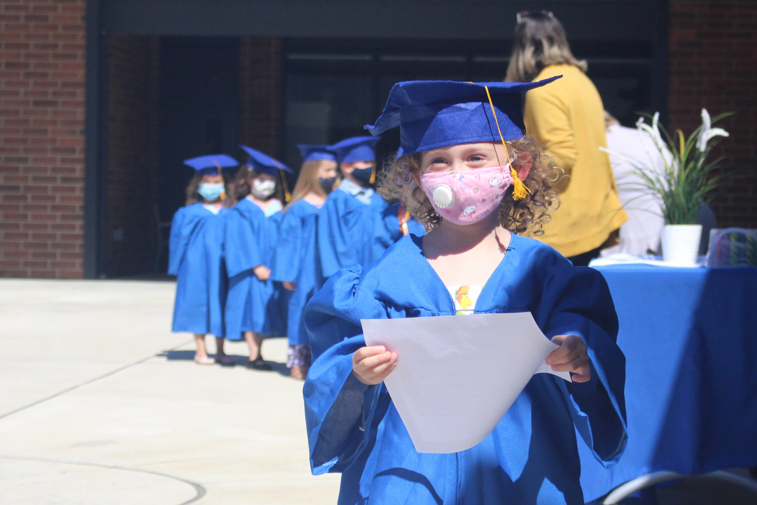 Preschooler Kyli Petrie is pictured graduating from Ridgefield’s Early Learning Center.