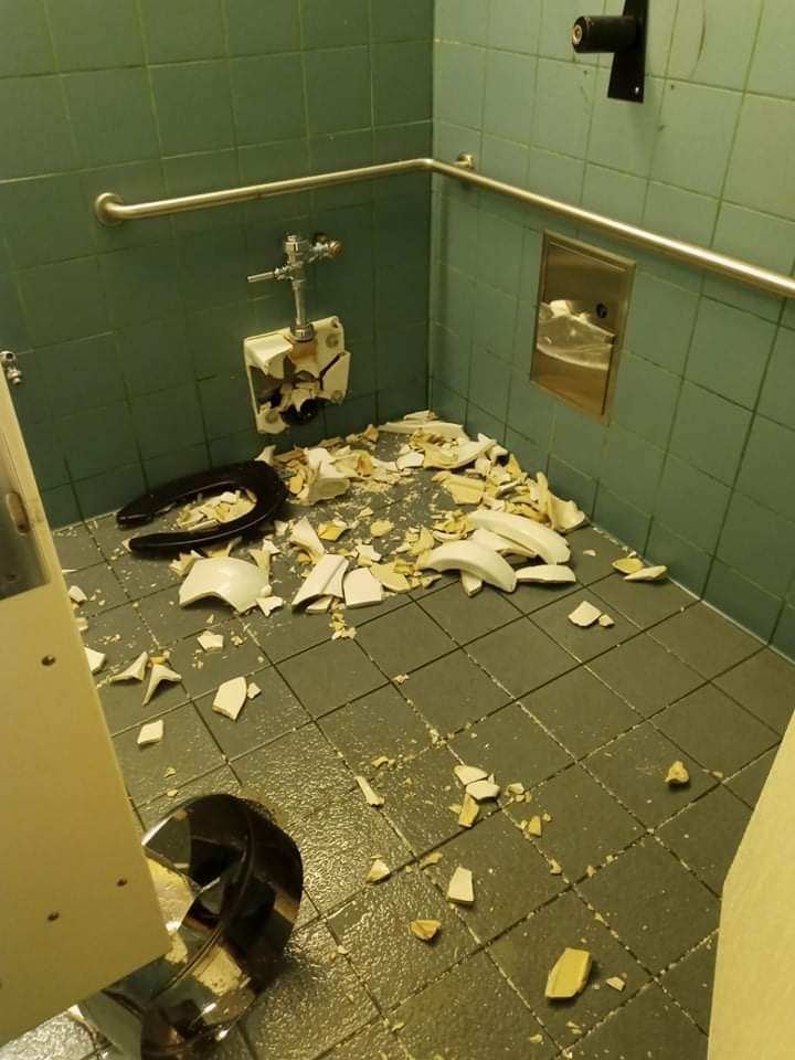 A smashed toilet at the Coldwater Lake Recreation Area at Mount St. Helens National Volcanic Monument is pictured.