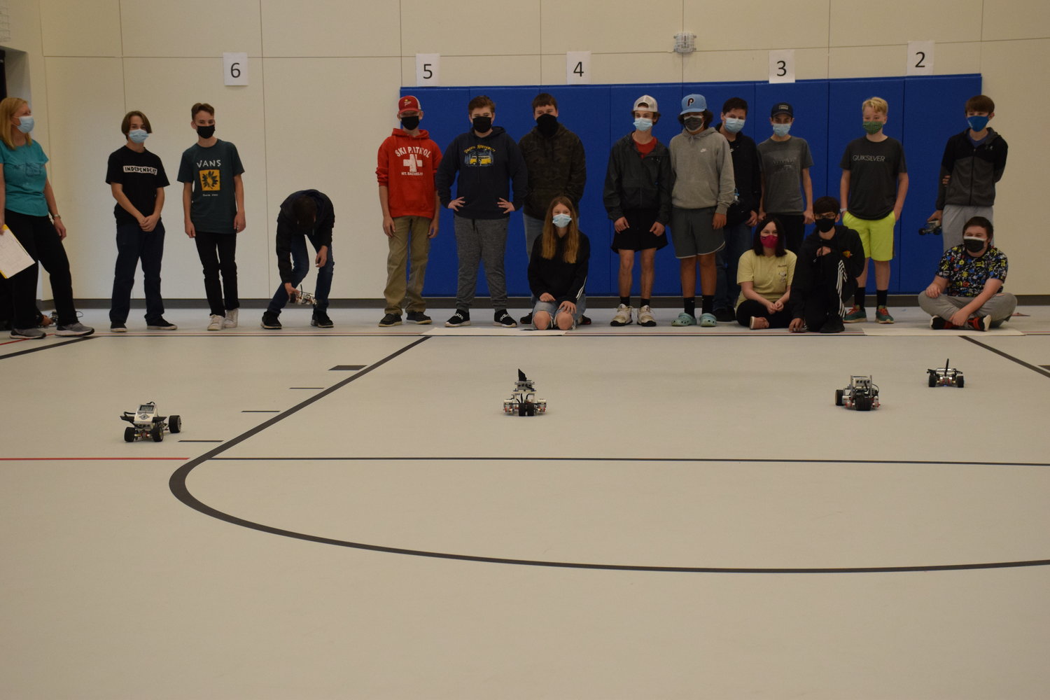La Center Middle School teacher Kristy Schneider’s advanced robotics class tests out their drag racing robots in the small gym at the new middle school on Oct. 14.