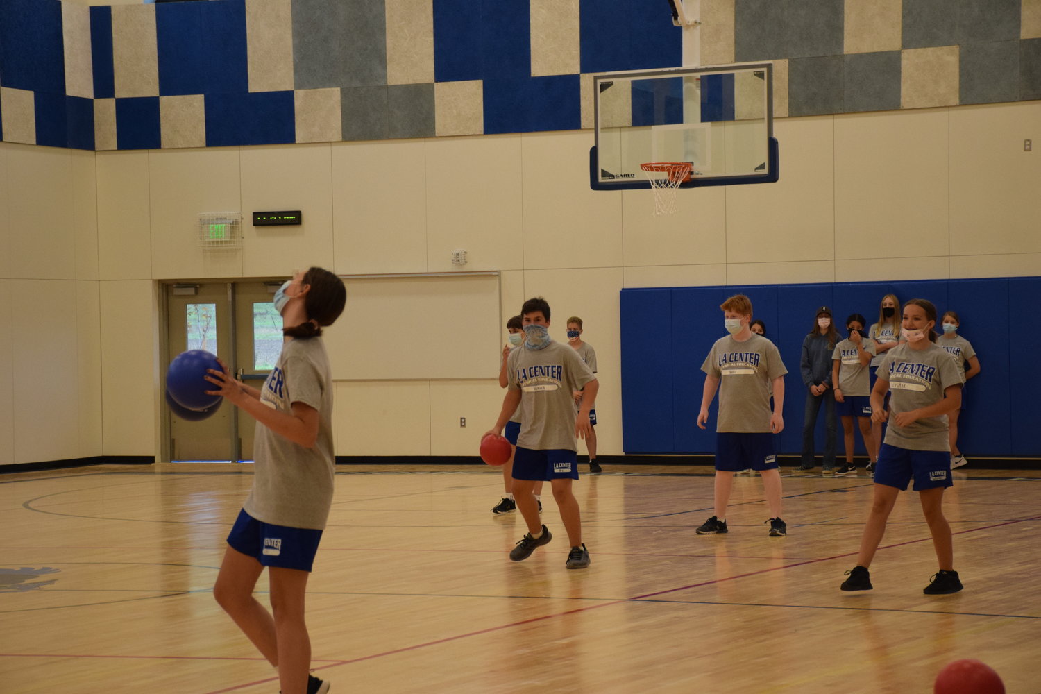 La Center Middle School students take part in dodgeball in the new school building’s large gym on Oct. 14.