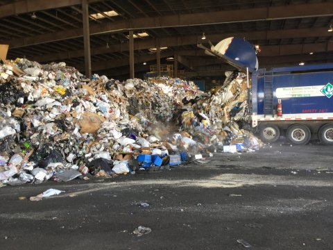 Garbage is pictured on the floor at a Clark County transfer station.