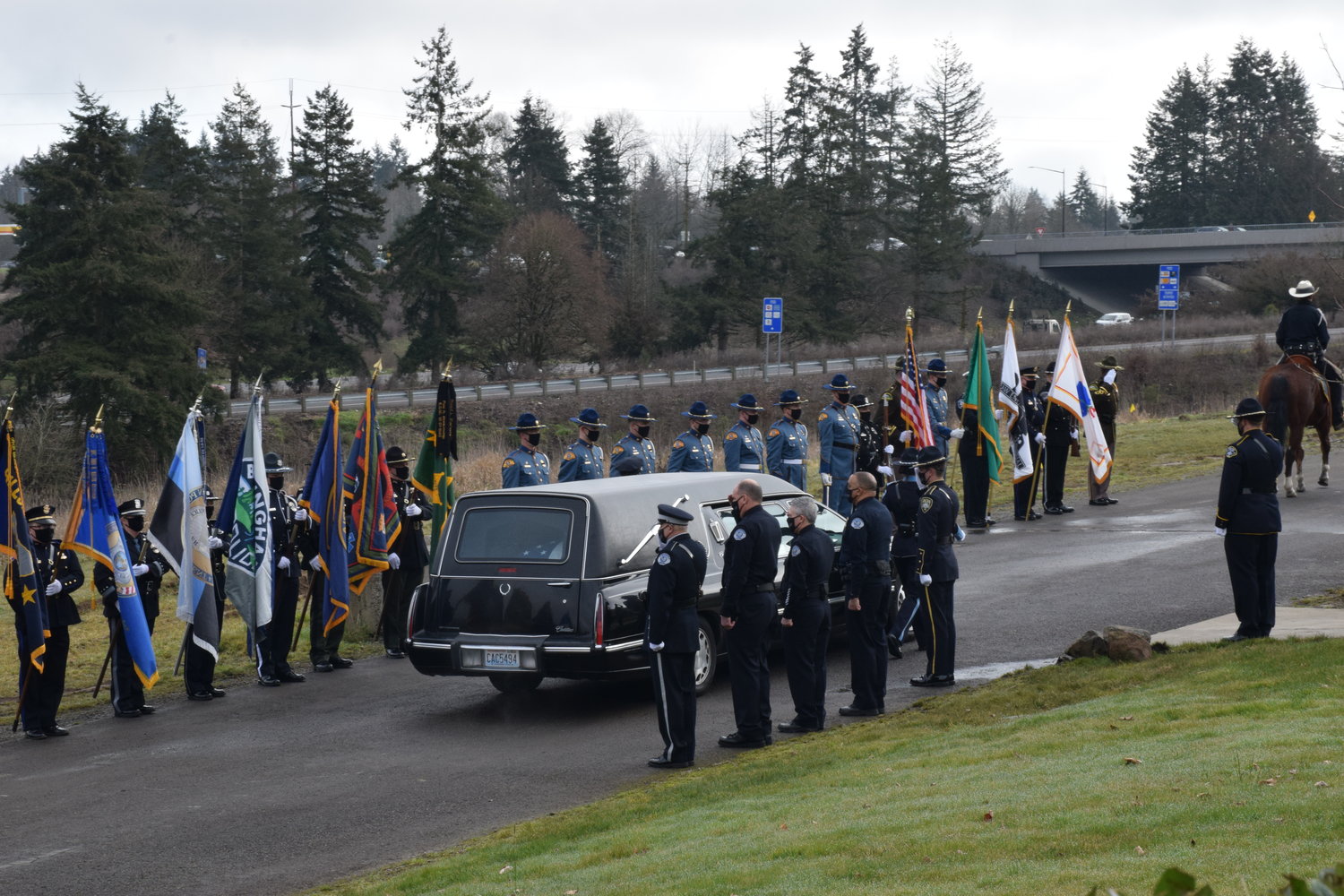 The hearse carrying Vancouver Police Officer Donald Sahota arrives at ilani for a memorial ceremony on Feb. 8.