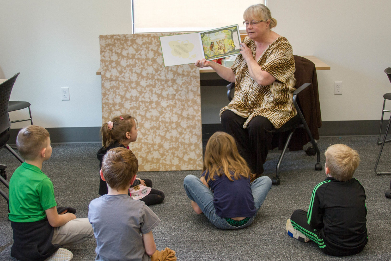 Yale kindergartners listen to a librarian read aloud at the Yale Valley Community Library.