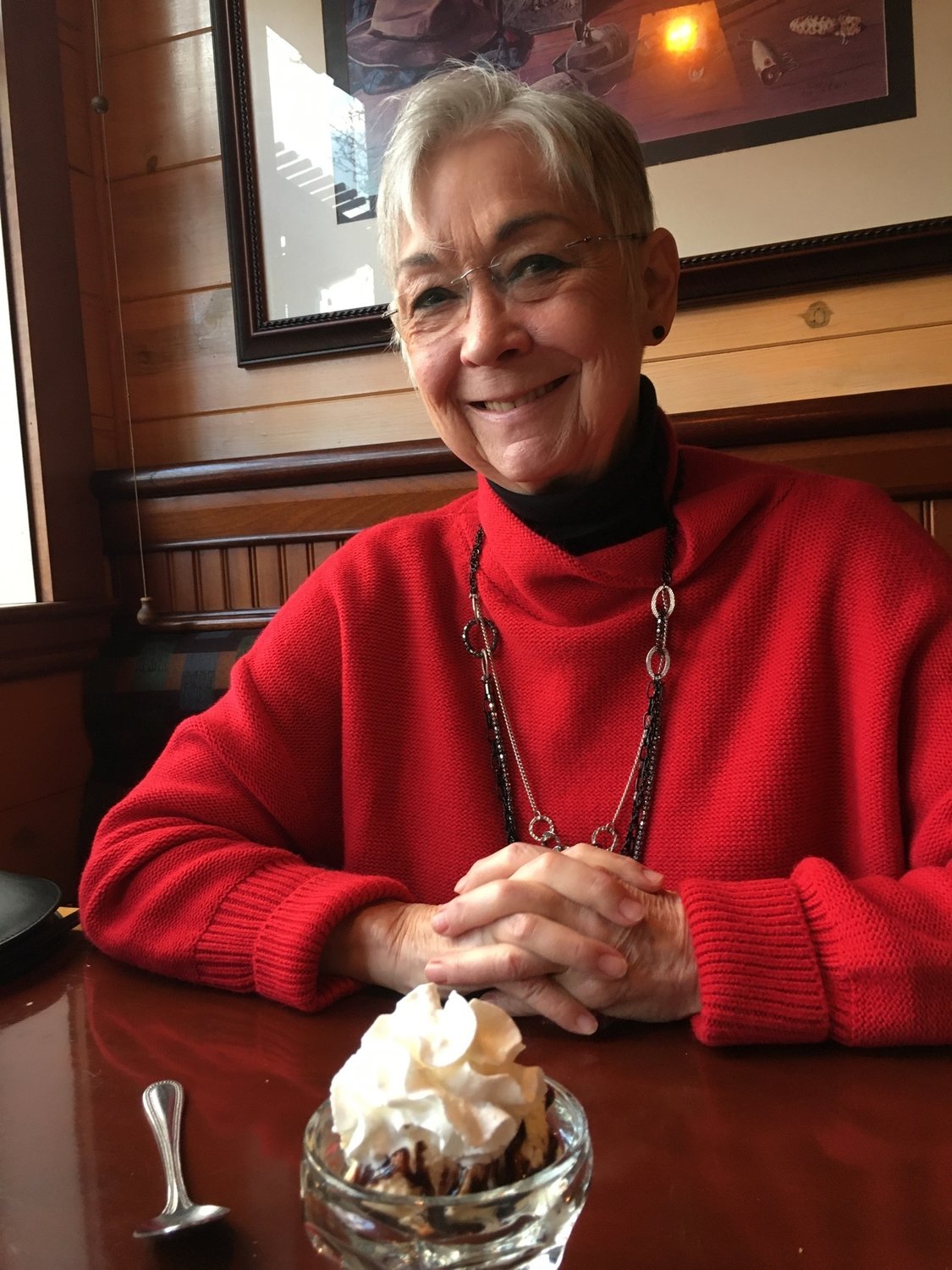 Former Reflector advertising director Darlene Carr enjoys a dessert for her 73rd birthday earlier this year
