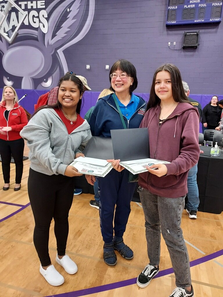 Eighth graders Andrea Uribe and Jordyn Vongnath Fair, from Pleasant Valley Middle School, are pictured with their teacher Irene “Rene” Soohoo.