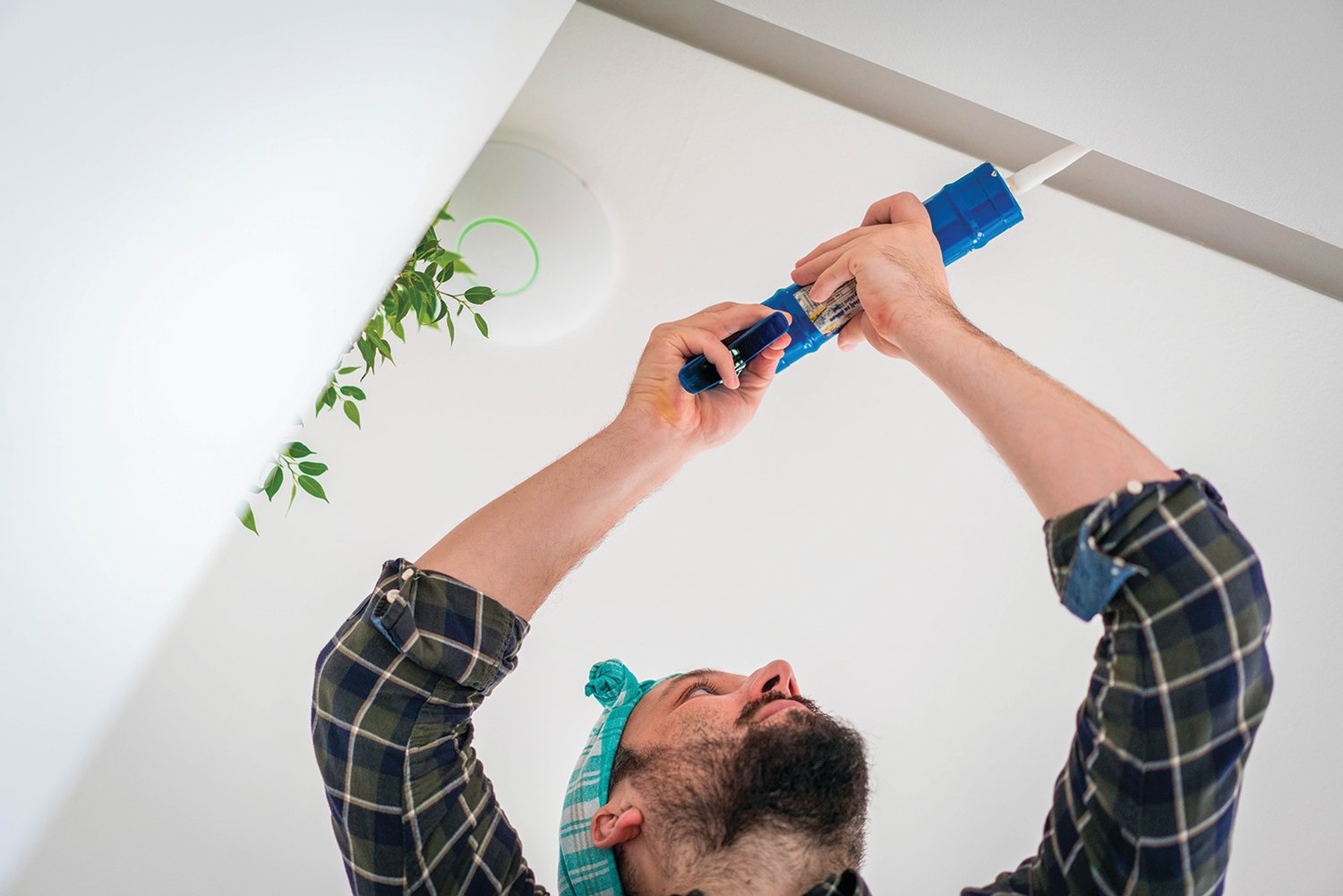 Applying caulk to ceiling fixtures of a home is a good way to stop less obvious leaks.