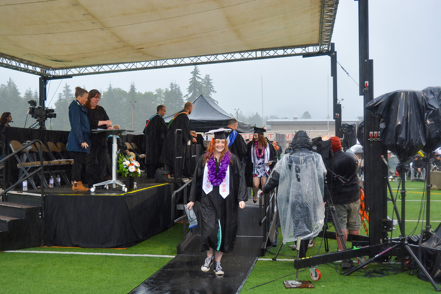 A student smiles after she receives her diploma at the Battle Ground High School graduation ceremony on June 10.