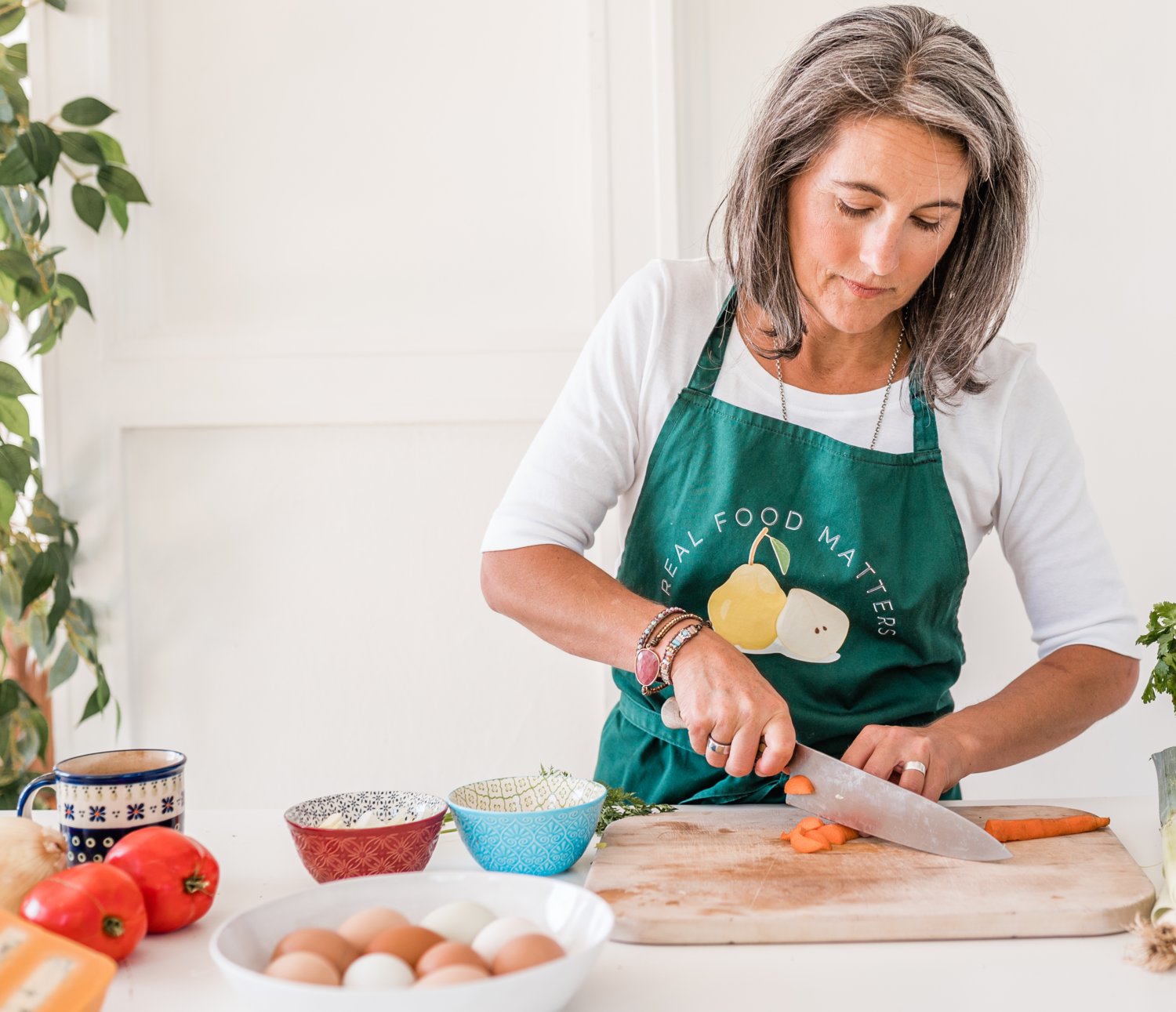 Karen Kennedy, a certified nutritionist, prepares a meal to help with chronic health issues.