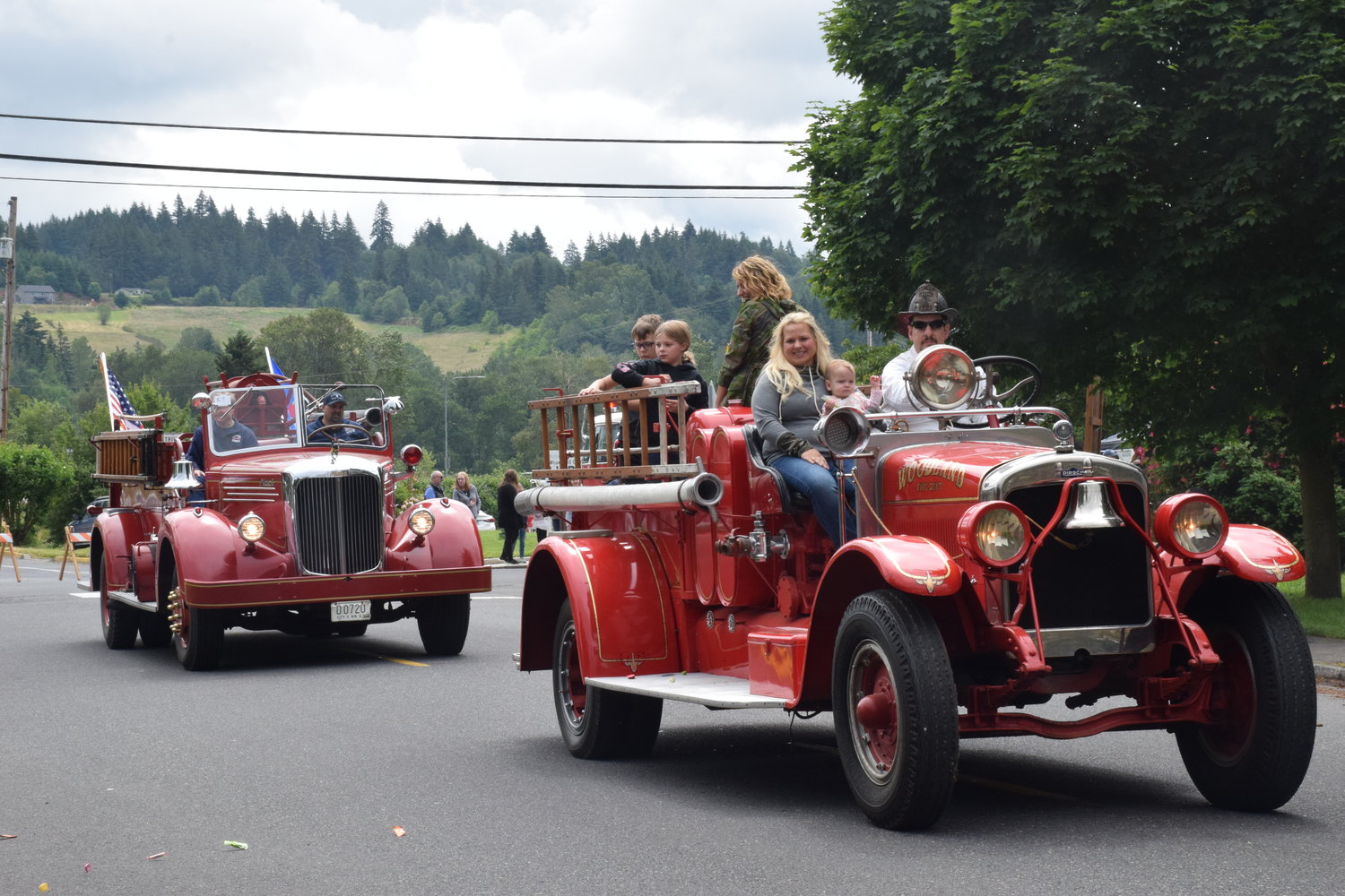 Antique fire engines drive in downtown Woodland during the 100th Planters Days celebration parade on June 18.