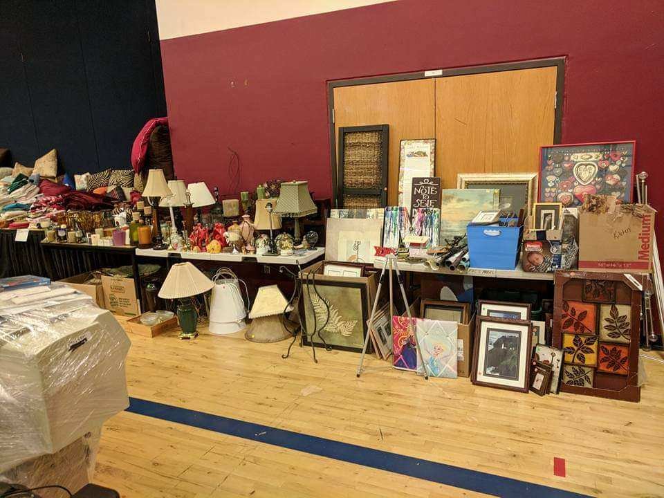 A number of lamps and artwork sit on display at a previous rummage sale at Firm Foundation Christian School in Battle Ground.