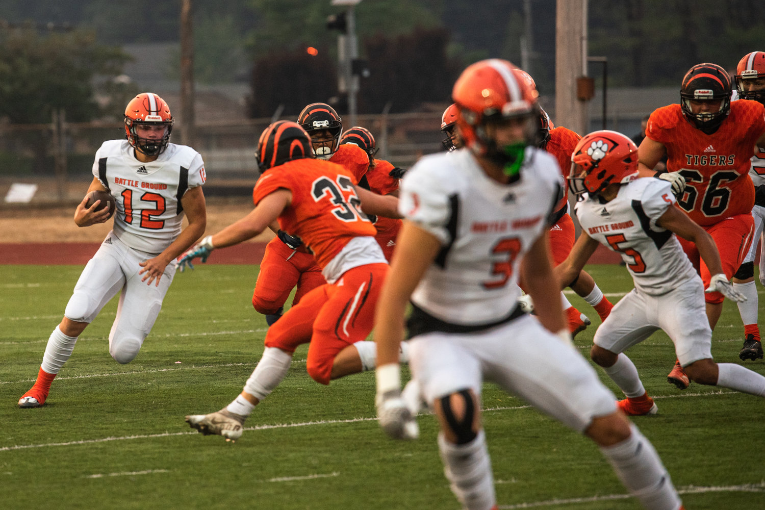 Battle Ground quarterback Kameron Spencer carries the ball up the field through Centralia’s defense during an away game on Friday night.