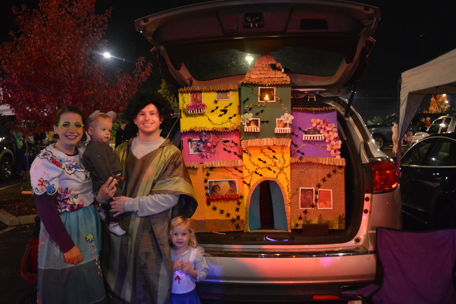 The Childs’ family displays their Encanto-themed trunk and costumes at the Ridgefield Outdoor Recreation Complex on Oct. 29.