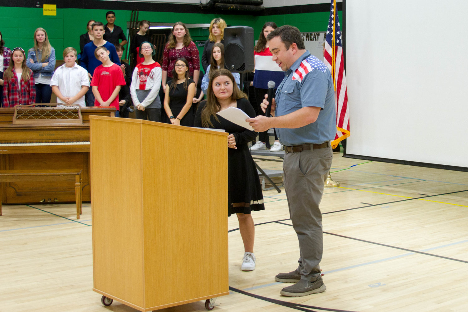 Abigail Alway initially thought Principal Russell Evans was recognizing her for a solo she performed during a Veterans Day assembly but she was later surprised by her uncle who returned home on temporary leave.