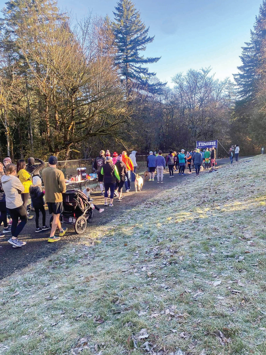 Participants wait to start the 2022 Thanksgiving Fun Run along the East Fork Lewis River.