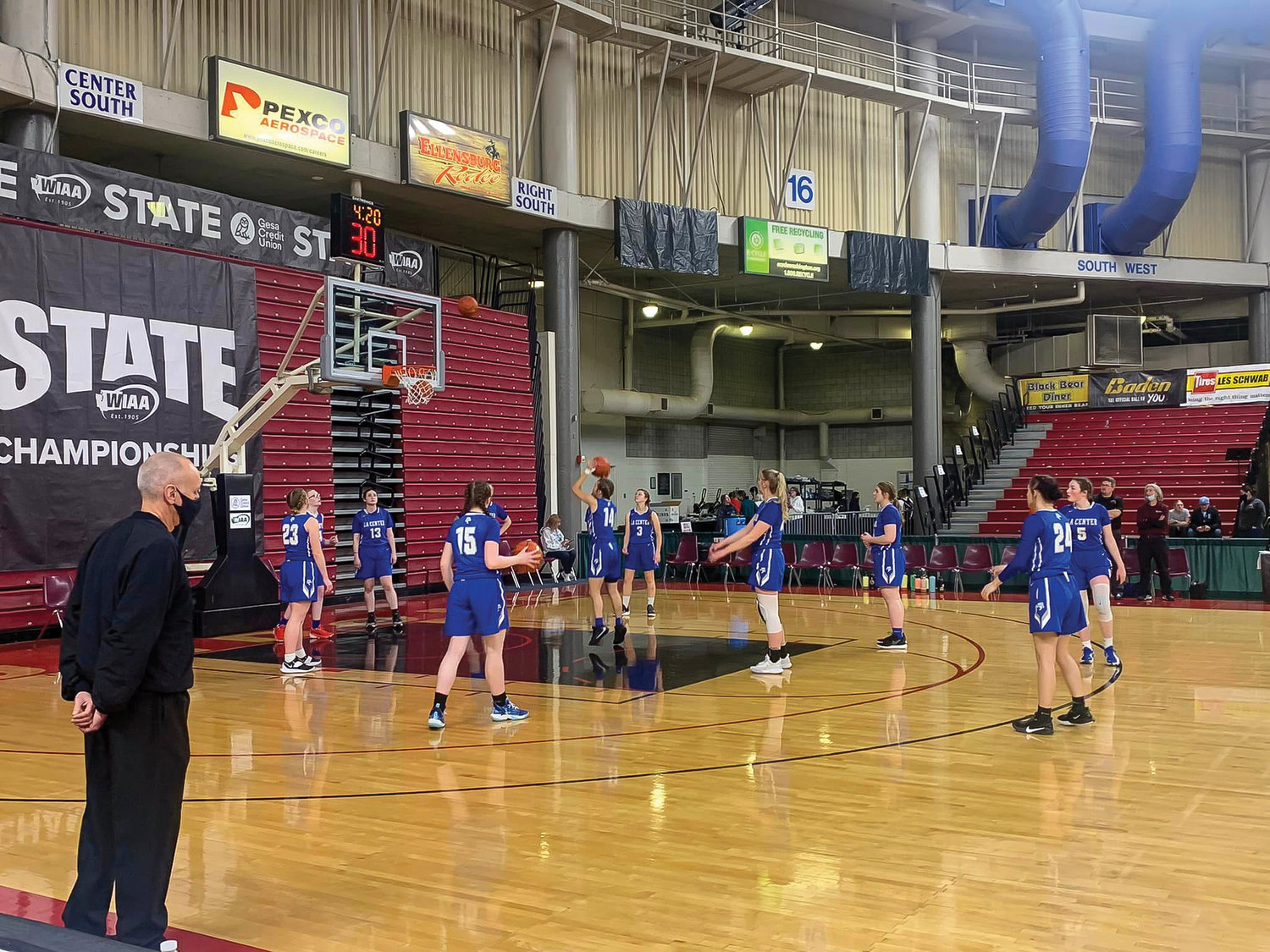 The La Center Wildcat girls basketball team warms up at the Yakima Sundome on March 2 ahead of their game against Colville in the WIAA 2A state tournament.