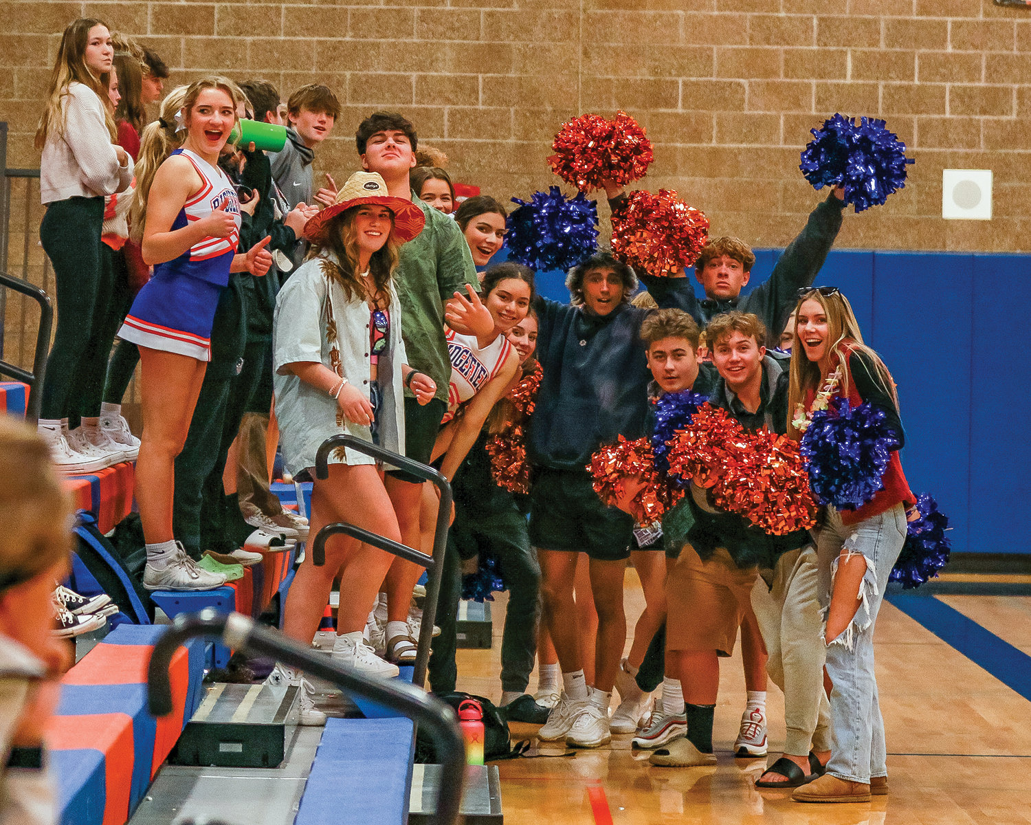 The Ridgefield student section swapped roles with the cheerleaders during a game against La Center on Monday, Dec. 19.