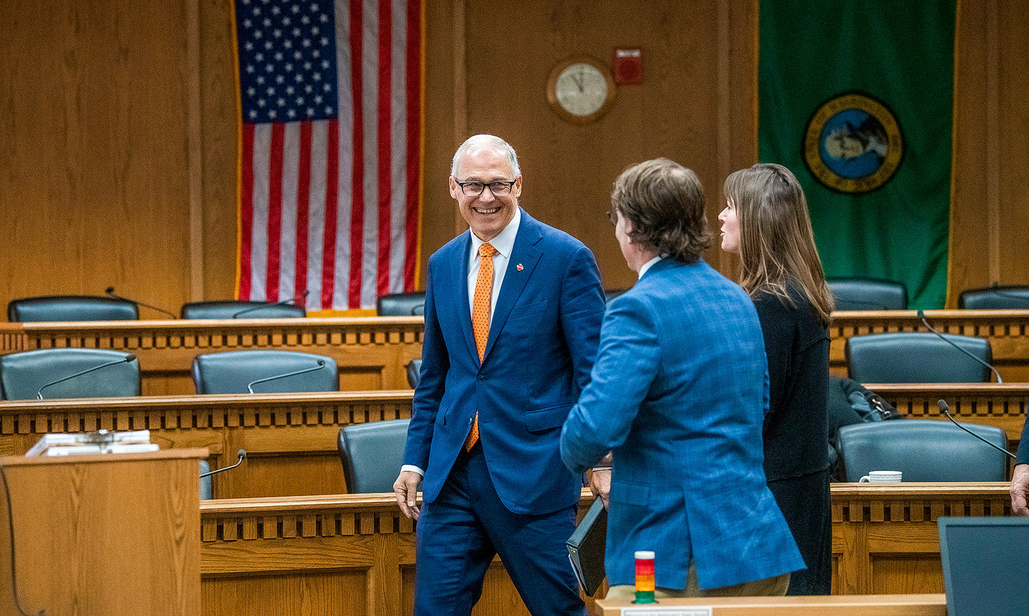 Governor Jay Inslee smiles before taking questions from members of the press on Thursday inside the John A. Cherberg Building in Olympia.