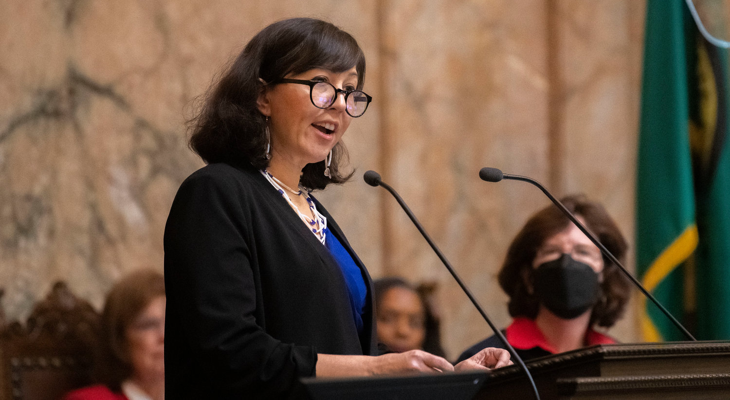 Washington state Poet Laureate Rena Priest wrote and delivered a poem titled, “These Abundant and Generous Homelands,” before Inslee’s 2023 State of the State speech inside the House Chambers Tuesday in Olympia.