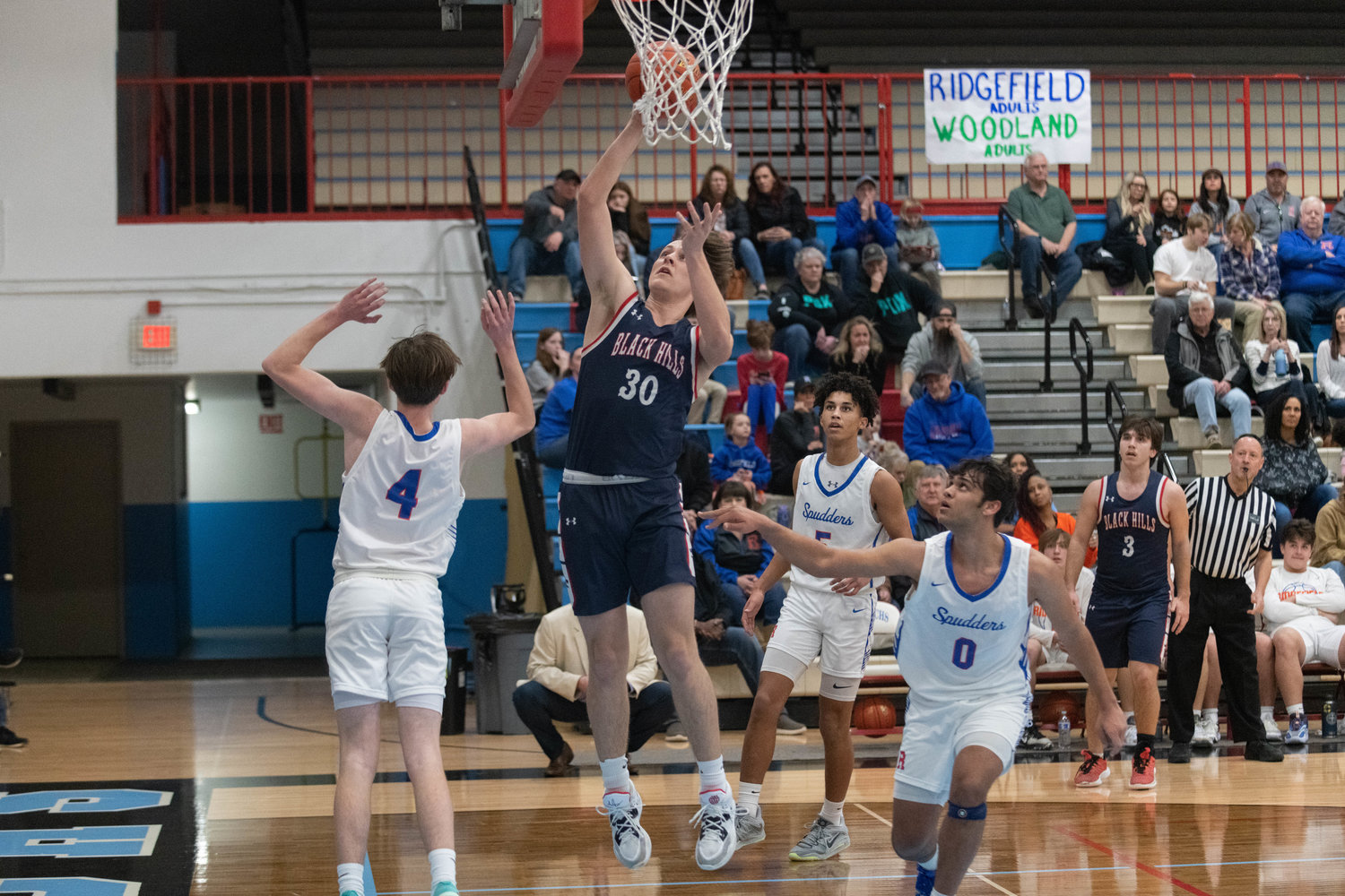 Keagan Rongen goes up in the post during the first quarter of Black Hills' district loser-out matchup against Ridgefield on Feb. 16 at Mark Morris.