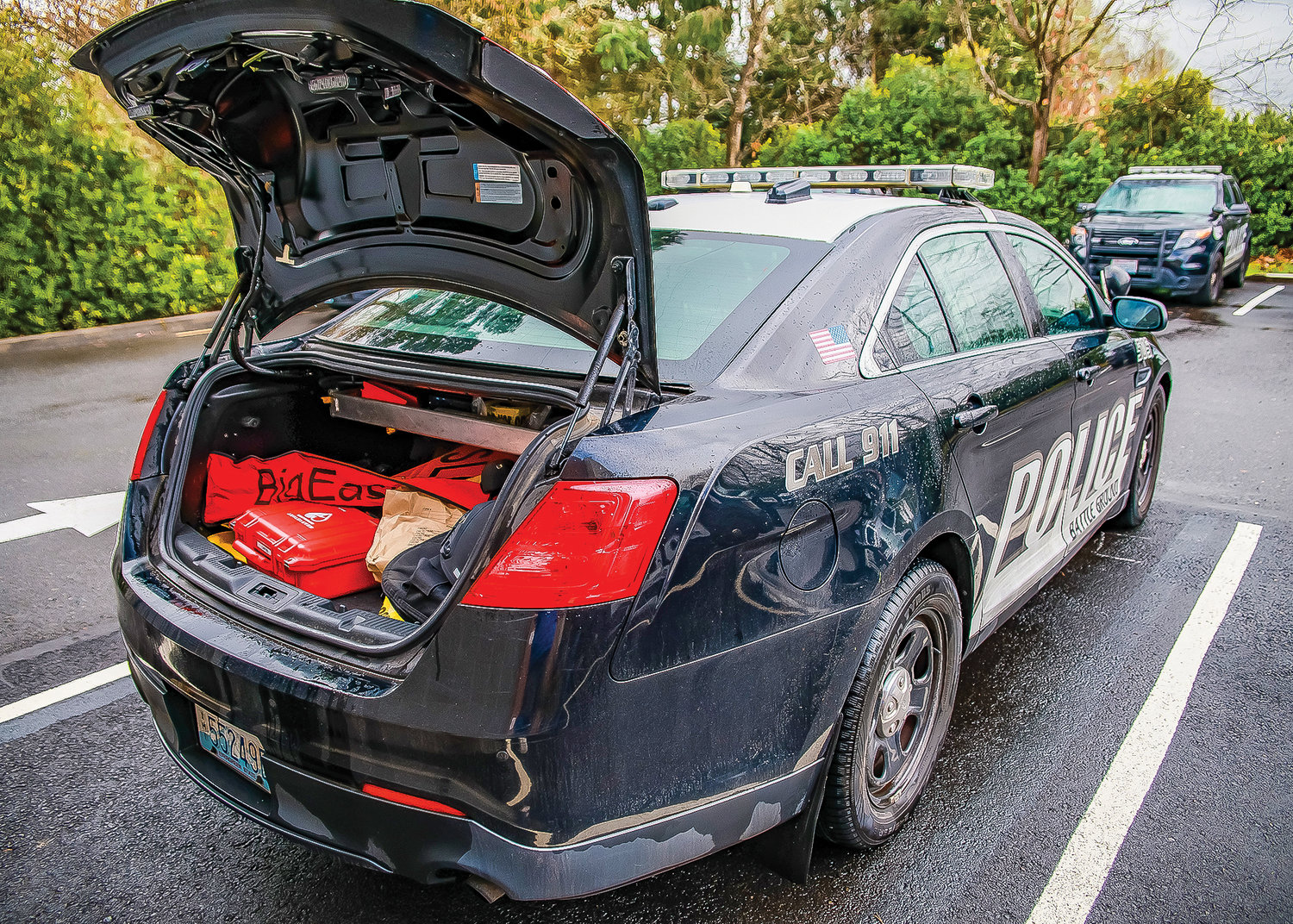 An AED unit is equipped in every Battle Ground patrol vehicle and supervisor vehicle as seen with the red container in the trunk of School Resource Officer Anderson's vehicle on Friday, March 10.