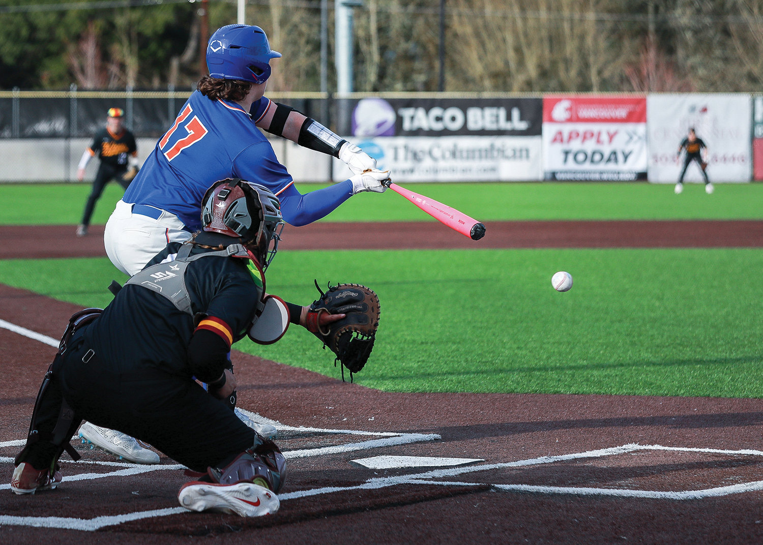 Ridgefield's Liam Ostrom swings and misses for strike three on a pitch by Prairie's Brady Trombello on Tuesday, March 14.
