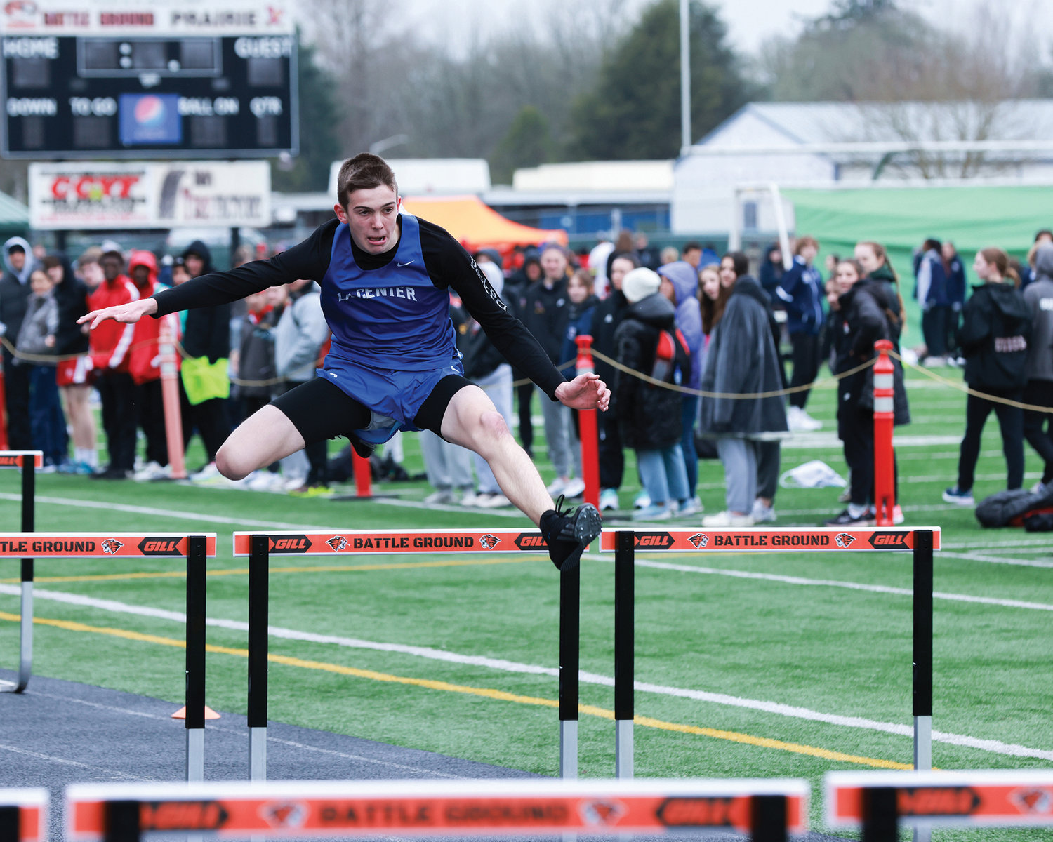 Ethan Wilson, a freshman for La Center, clears a 39-inch hurdle during heat three of the 110-meter hurdles at the Tiger Invite at Battle Ground High School on Saturday, March 25.