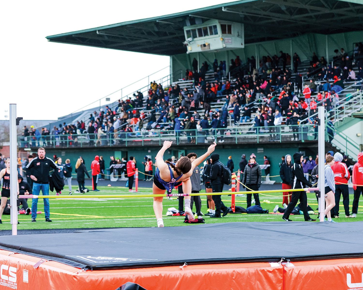 A girls high jumper for Ridgefield clears the bar at the Tiger Invite at Battle Ground High School on Saturday, March 25.