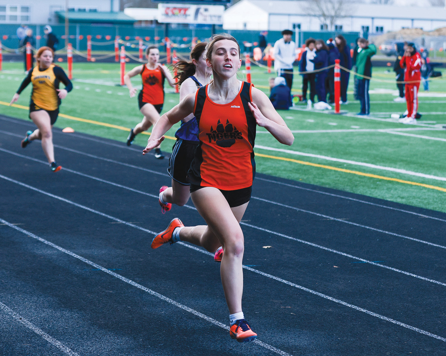 Battle Ground's Katarina Sawczuk competes in heat five of the 200-meter race at the Tiger Invite at Battle Ground High School on Saturday, March 25.