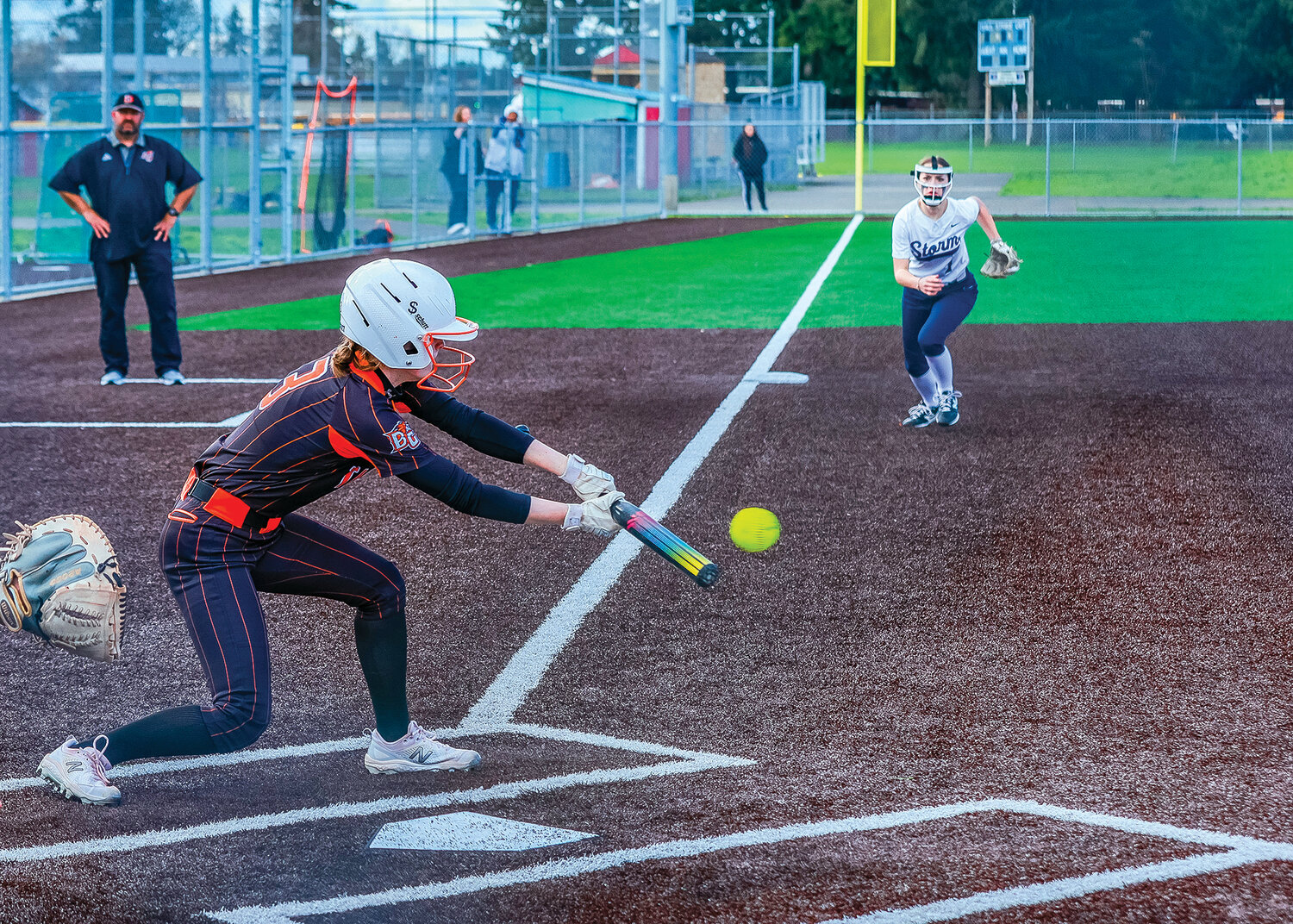 Candice Torgerson attempts a bunt for the Tigers during a game against Skyview at Fort Vancouver High School on Wednesday, April 12.
