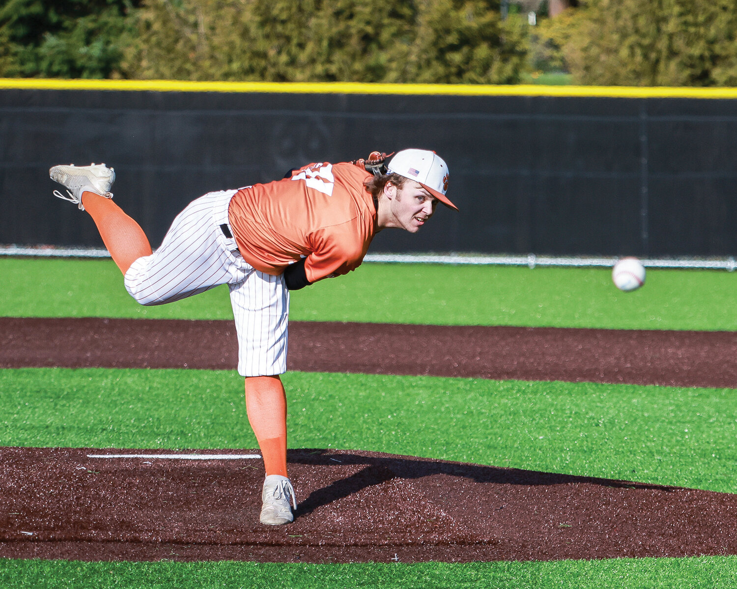 Battle Ground pitcher Ty Linster throws a fastball down the middle during the team's game one loss to Camas on Tuesday, April 11.