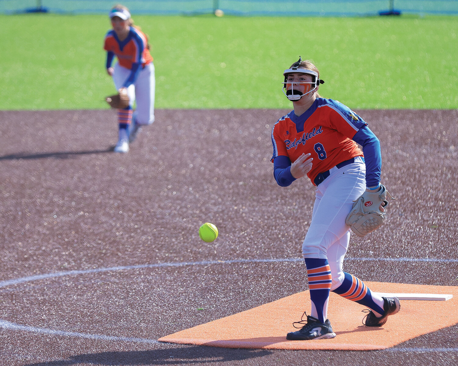 Ridgefield's Elizabeth Peery fires in a pitch during the team's win against Hockinson on Wednesday, April 19.
