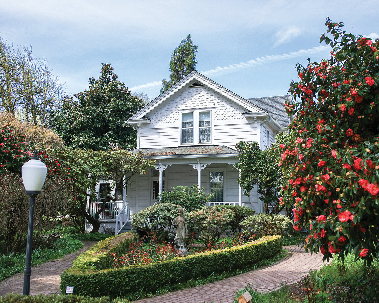 The 1889 Victorian farmhouse at the Hulda Klager Lilac Gardens is pictured on Tuesday, April 25.