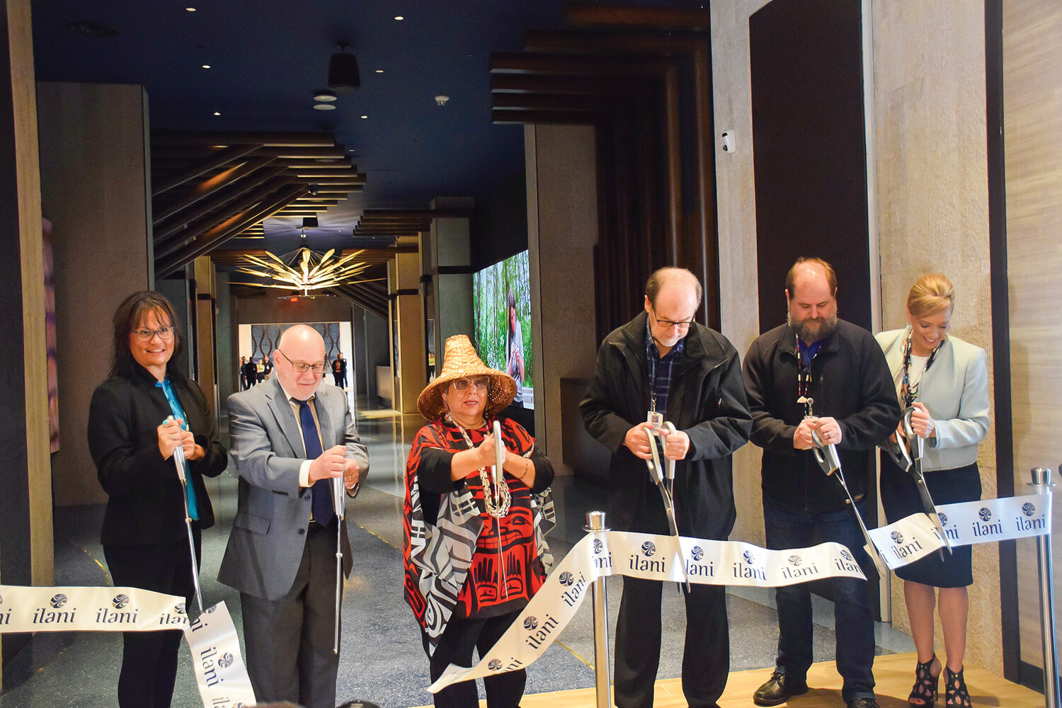 Officials cut the ribbon on ilani’s new hotel during a grand opening of the facility on April 24.