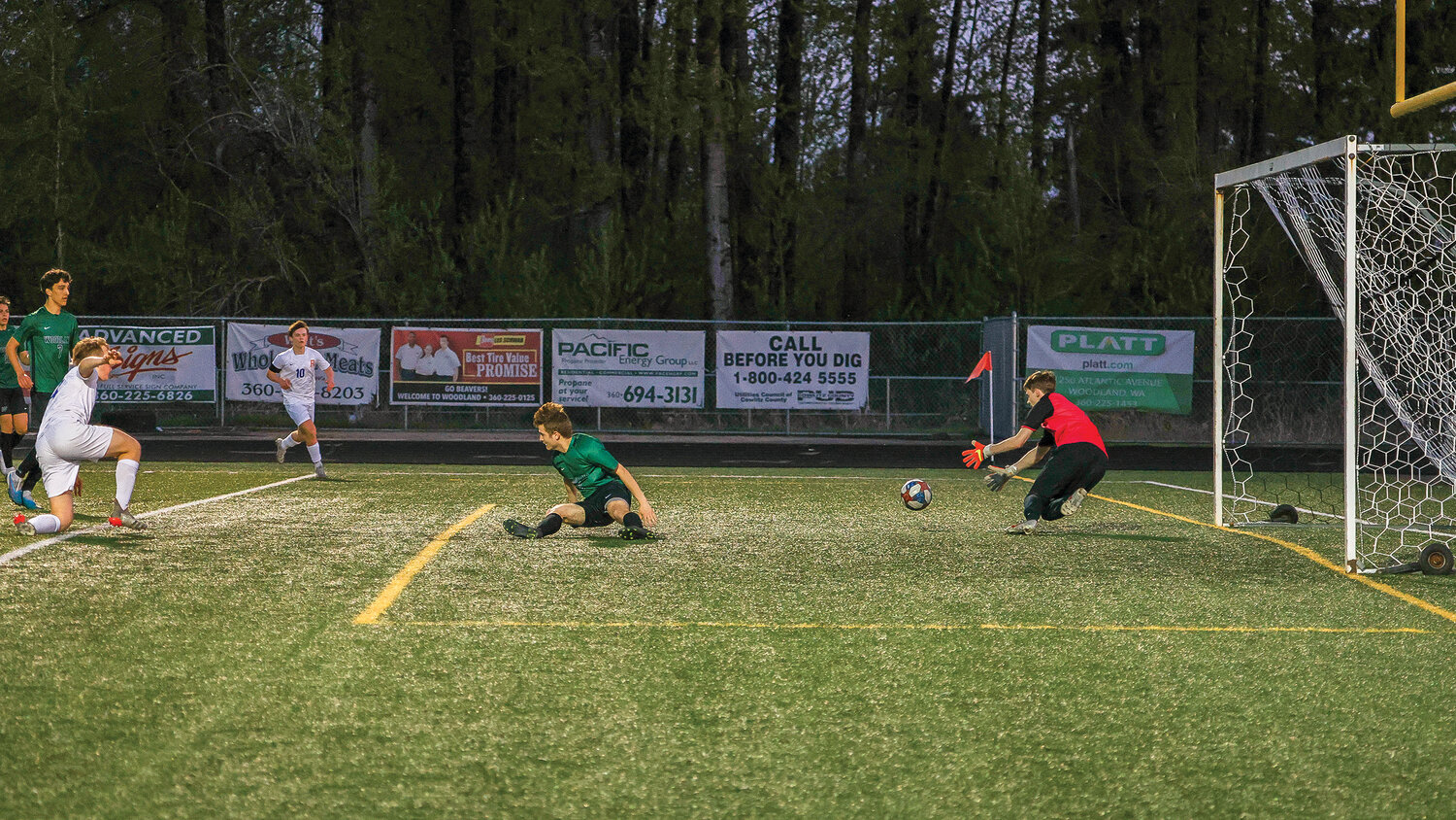 Woodland goalie Keaton Northcut makes a save during the team's 1-0 loss to Ridgefield on Thursday, April 27.