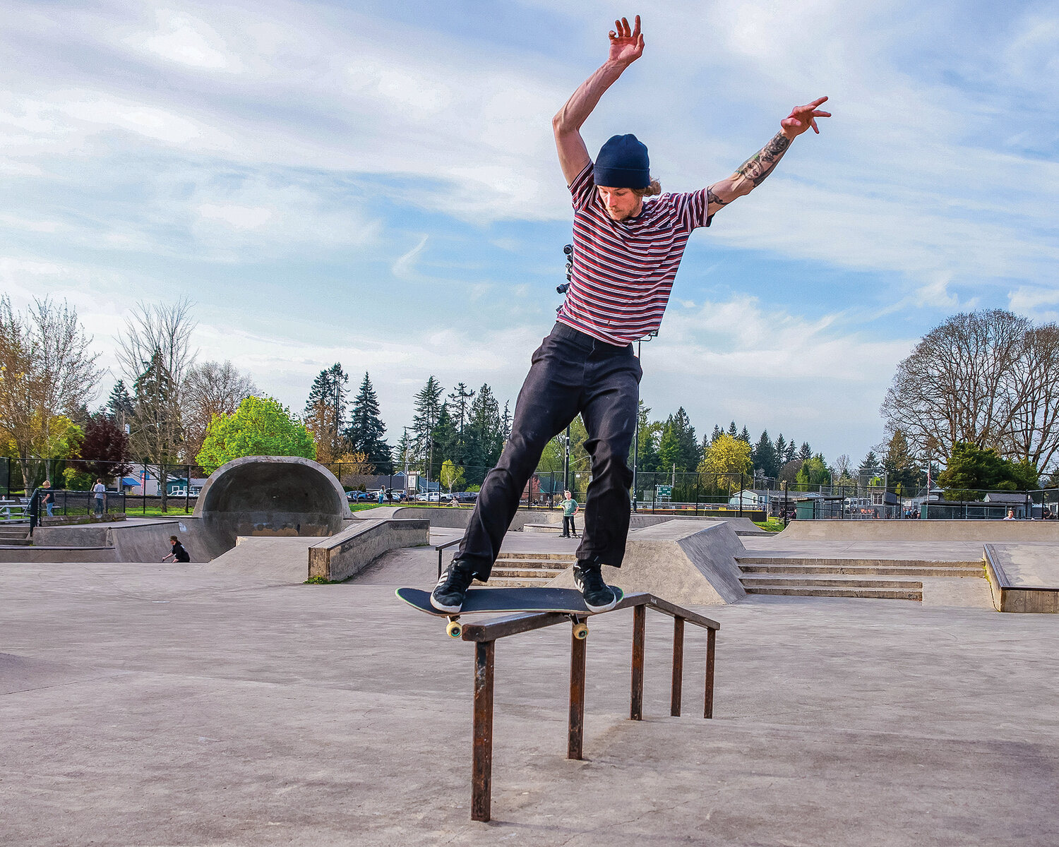 Justin Berni, a resident of Battle Ground, rides a rail at the Battle Ground Skate Park on the evening of Tuesday, May 2.