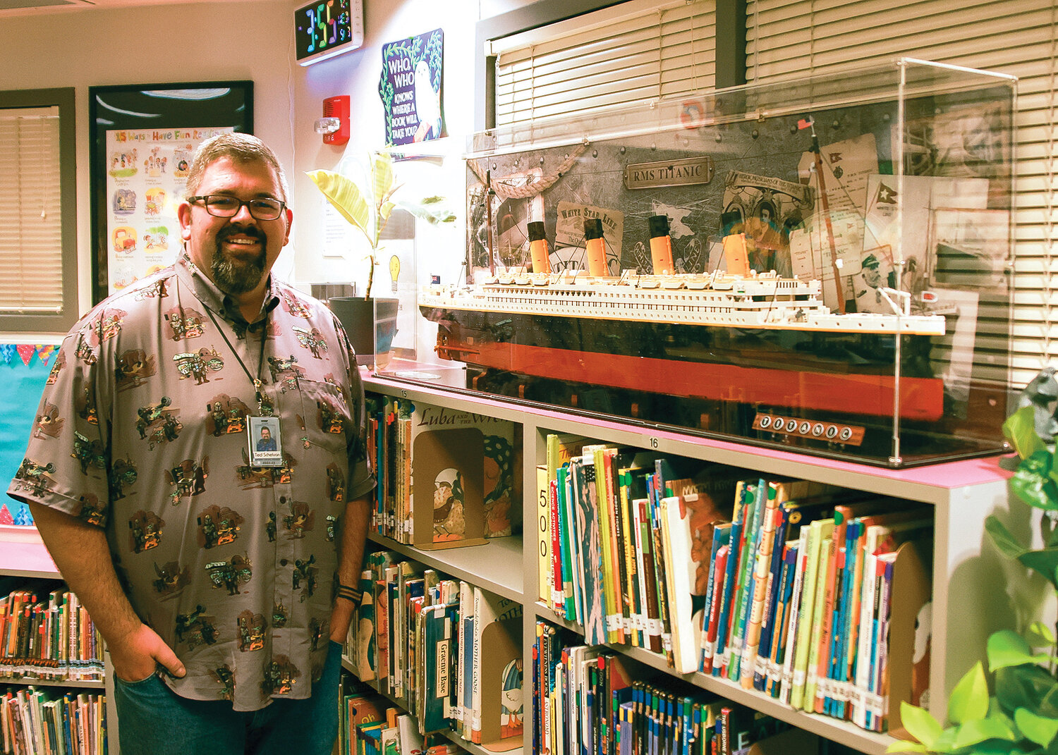 Captain Strong Primary School librarian Ted Schelvan stands with his students favorite Lego set, the Titanic, on Wednesday, May 3.