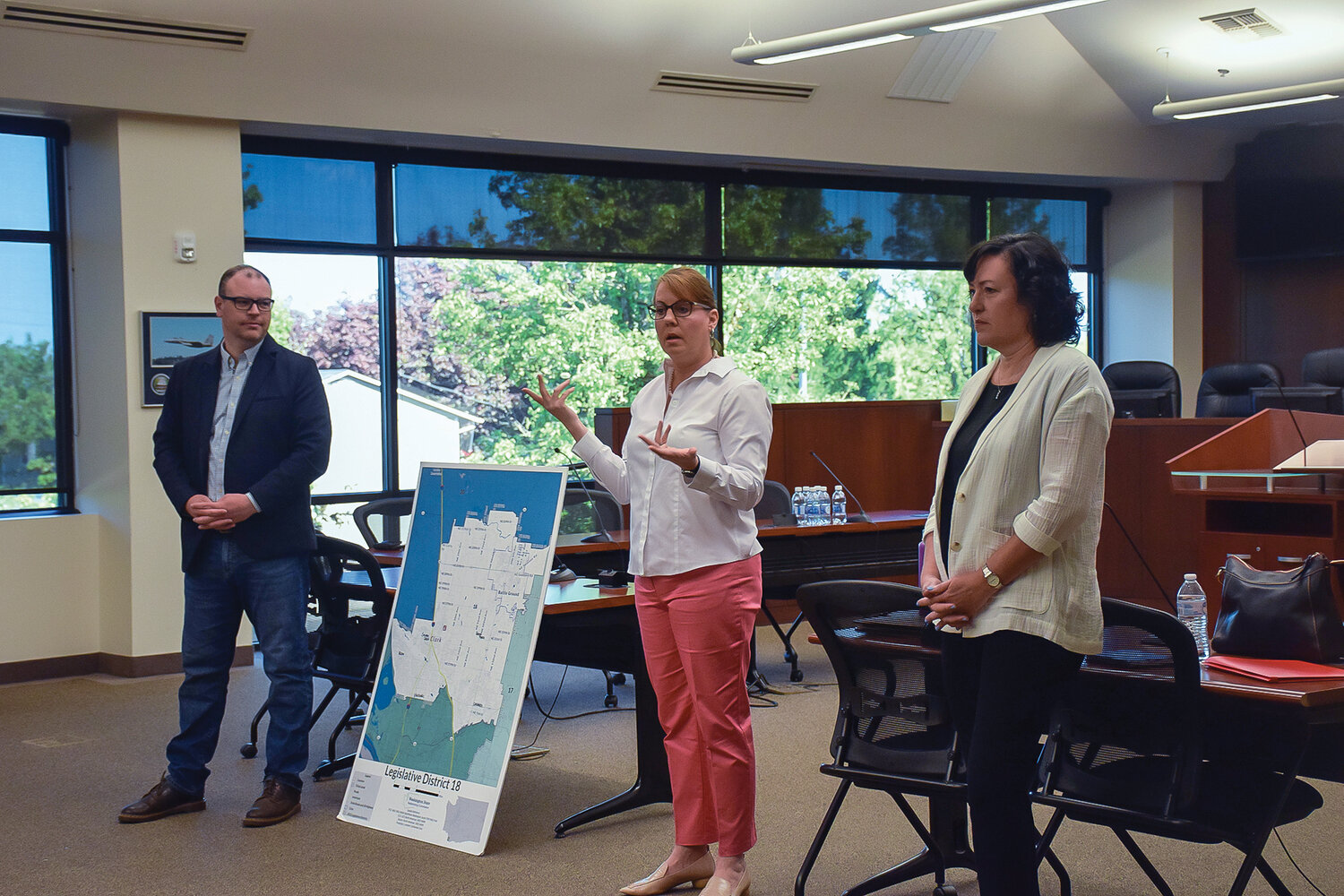 Republican Washington state Sen. Ann Rivers, center, speaks to constituents gathered at Battle Ground City Hall on May 13 for a town hall meeting. State Reps. Greg Cheney, left, and Stephanie McClintock, also took questions at the event.
