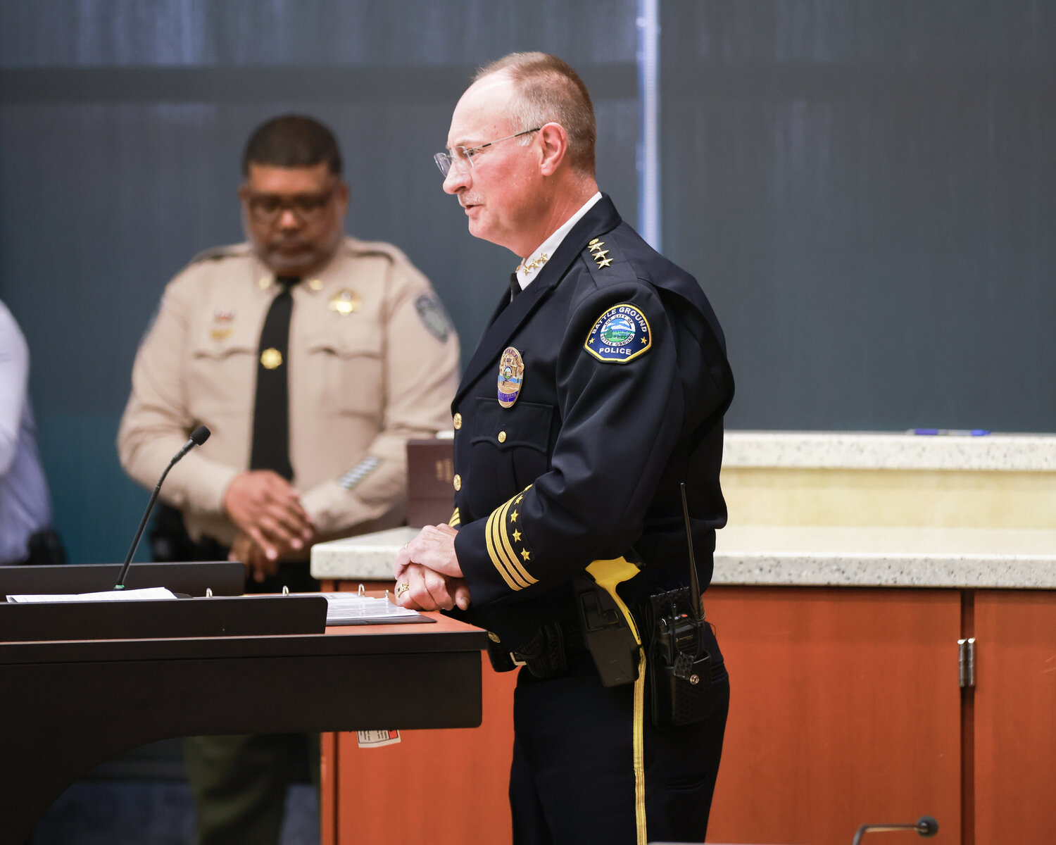 Battle Ground Police Chief Mike Fort reads the "roll call of honor" during the Clark County Law Enforcement Memorial Ceremony at the Public Service Center in Vancouver on Thursday, May 18, 2023