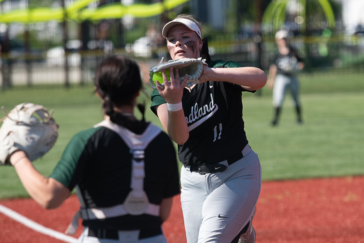 Woodland's Brynn Skelton catches a pop-up during the Beavers' 4-3 loss to Tumwater in the quarterfinals of the 2A District 4 tournament on May 18 at Rec Park in Chehalis.