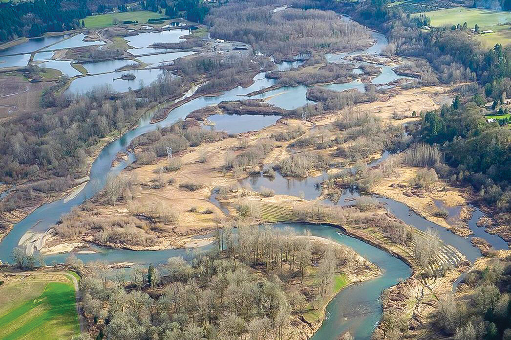An aerial photo shows the Ridgefield Pits area looking upstream. Washington state’s 2023 capital budget includes about $5.6 million for a restoration project  intended to improve the East Fork Lewis River where it runs through the pits area.