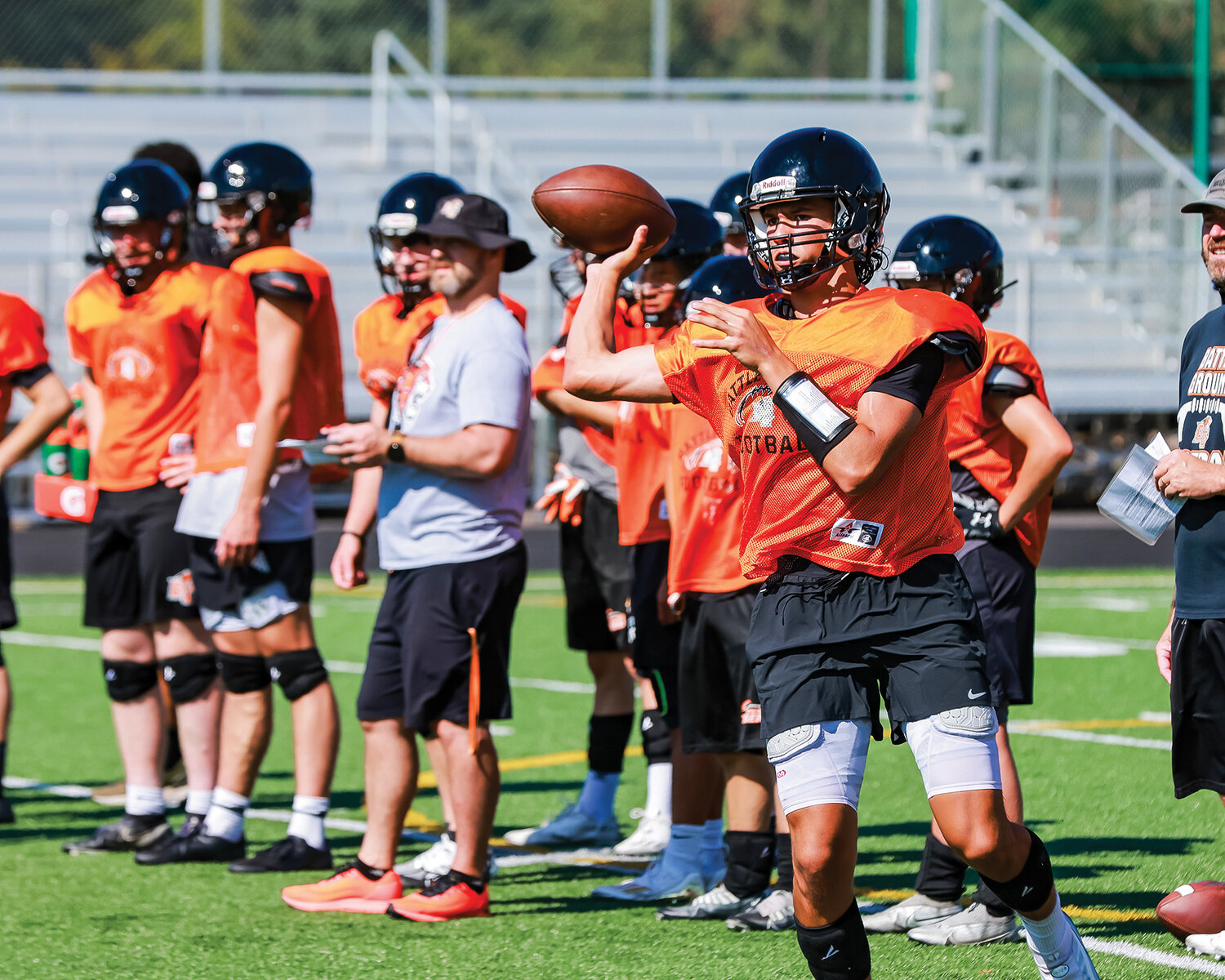 Battle Ground’s sophomore quarterback Ethan Adams prepares to throw the ball on Monday, Aug. 21.