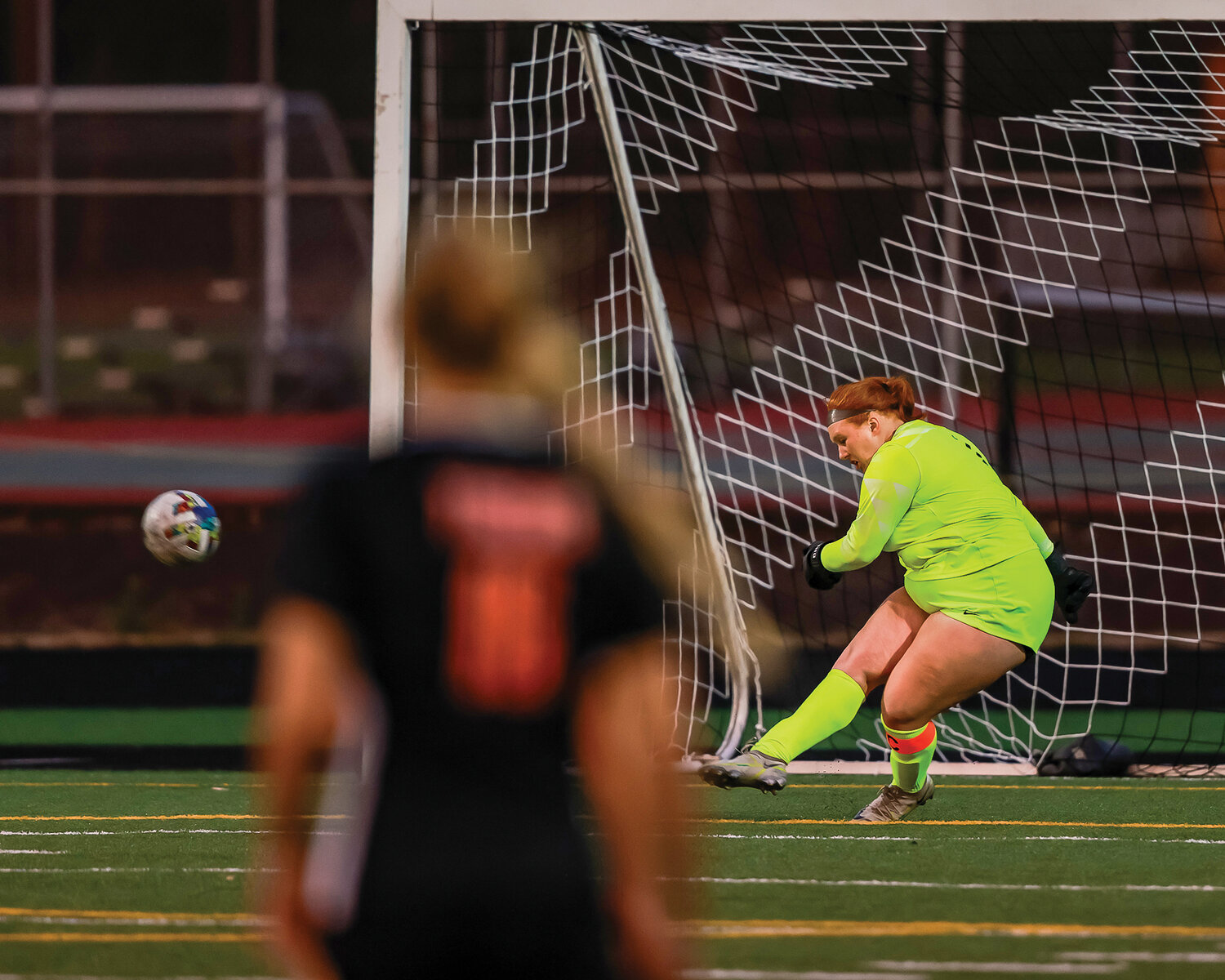 Battle Ground senior goalkeeper Clair Moss strikes the ball downfield during the Tigers’ 1-0 win over La Center on Tuesday, Sept. 12.
