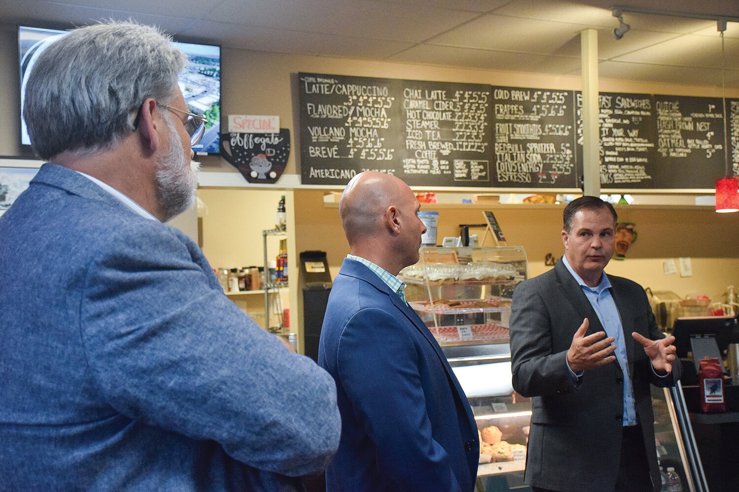 From left, Washington State Reps. Ed Orcutt and Peter Abbarno and state Sen. John Braun talk policy and politics during a meet-and-greet event Monday, Oct. 9 at Luckman Coffee in Woodland.