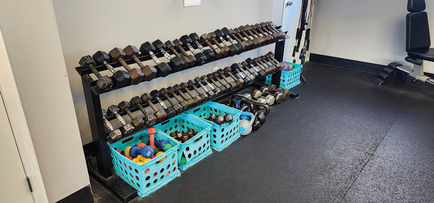 Silver&Fit attendees have various strength-training tools at their disposal in the aerobics classroom.